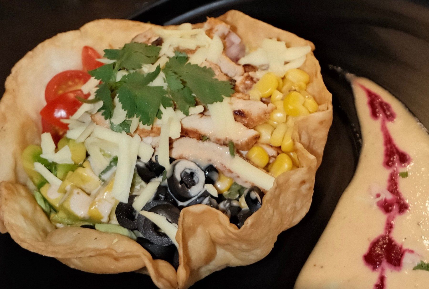 Smoked Spice Taco Salad in a crisp tortilla bowl