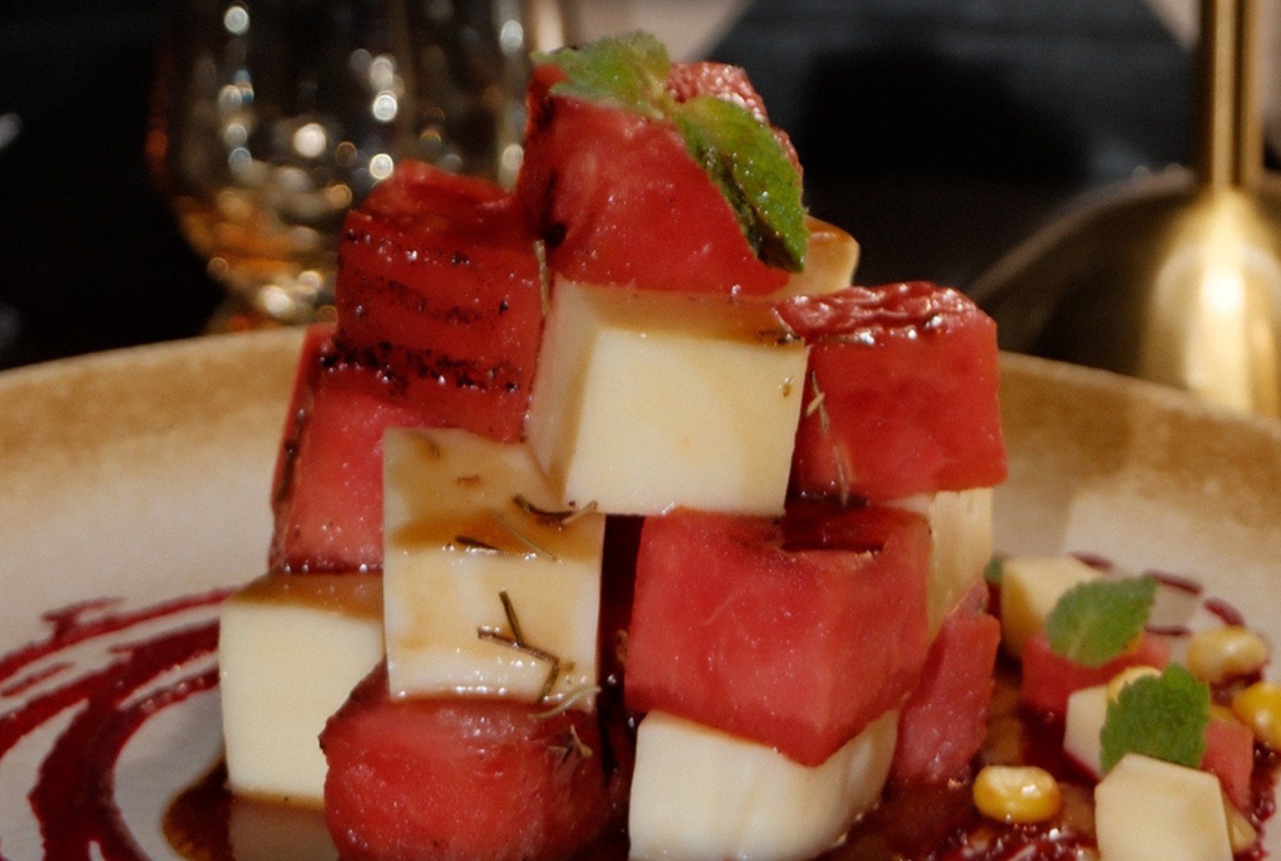 Grilled watermelon with feta and greens