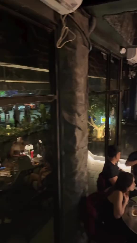 Guests at dinner in the stone walled dining room