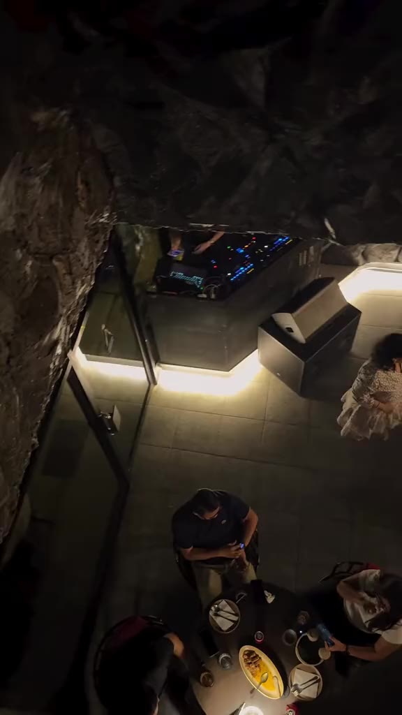 The bar and the tables seen from the upper floor
